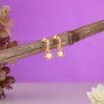 Ασημένια σκουλαρίκια κρίκοι με λουλούδι | Lalino.gr